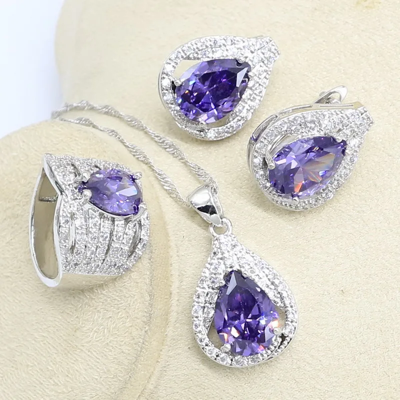 Искусственный роскошный браслет серебряного цвета с фиолетовым цирконом