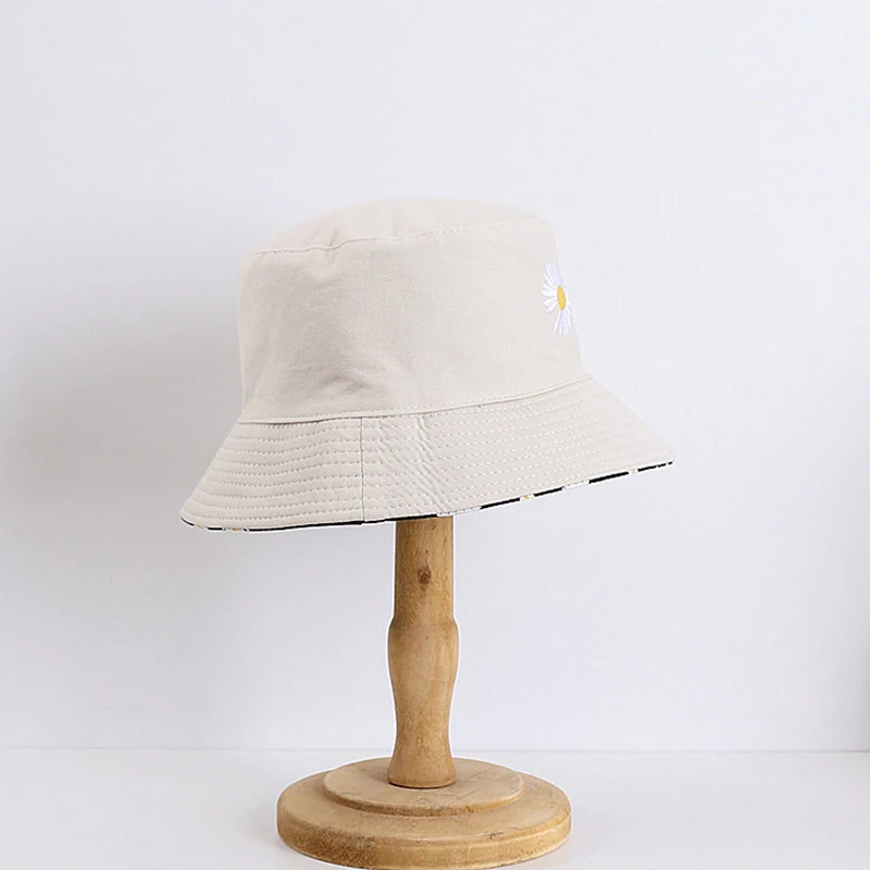 

Fashion Double-sided daisy fisherman hat Bucket female Shading Protection big eaves and art wild outdoor outing sunbath hat