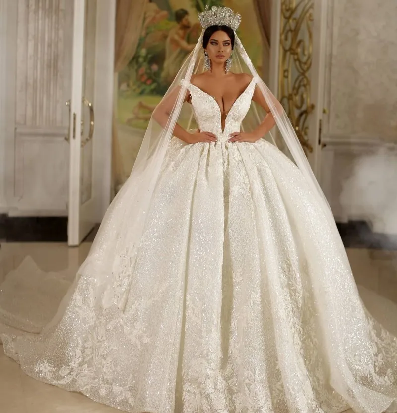 

Stunning Arabic Dubai Ball Gown Wedding Dress Deep V Neck Appliqued Backless Sequin Bridal Gowns robe de mariée 2020