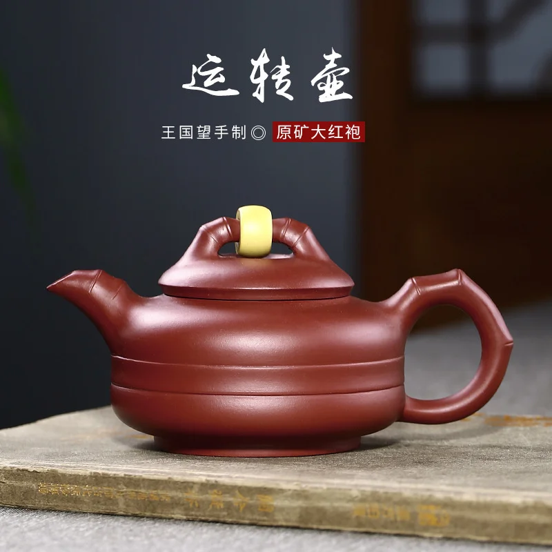 

Luck turns purple clay pot creative bamboo section pot Kingdom hope raw ore Dahongpao interesting bead turning Teapot Tea Set