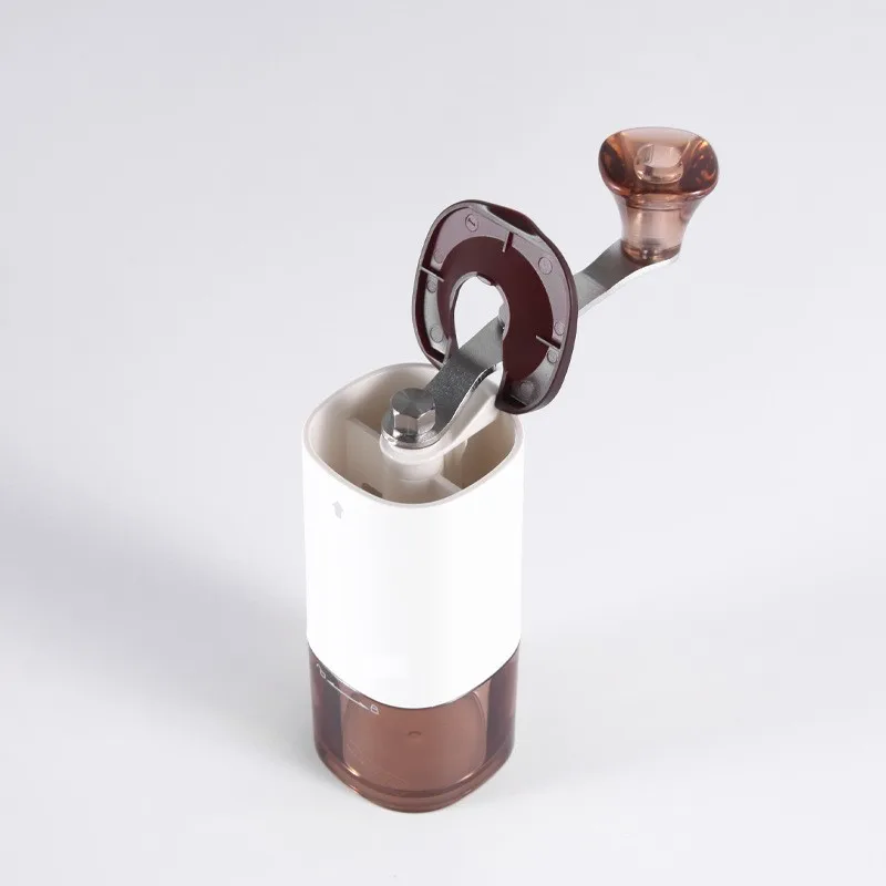 

Портативная ручная мини-кофемолка, ручная кофемолка, ручная кофемолка, белая фотография