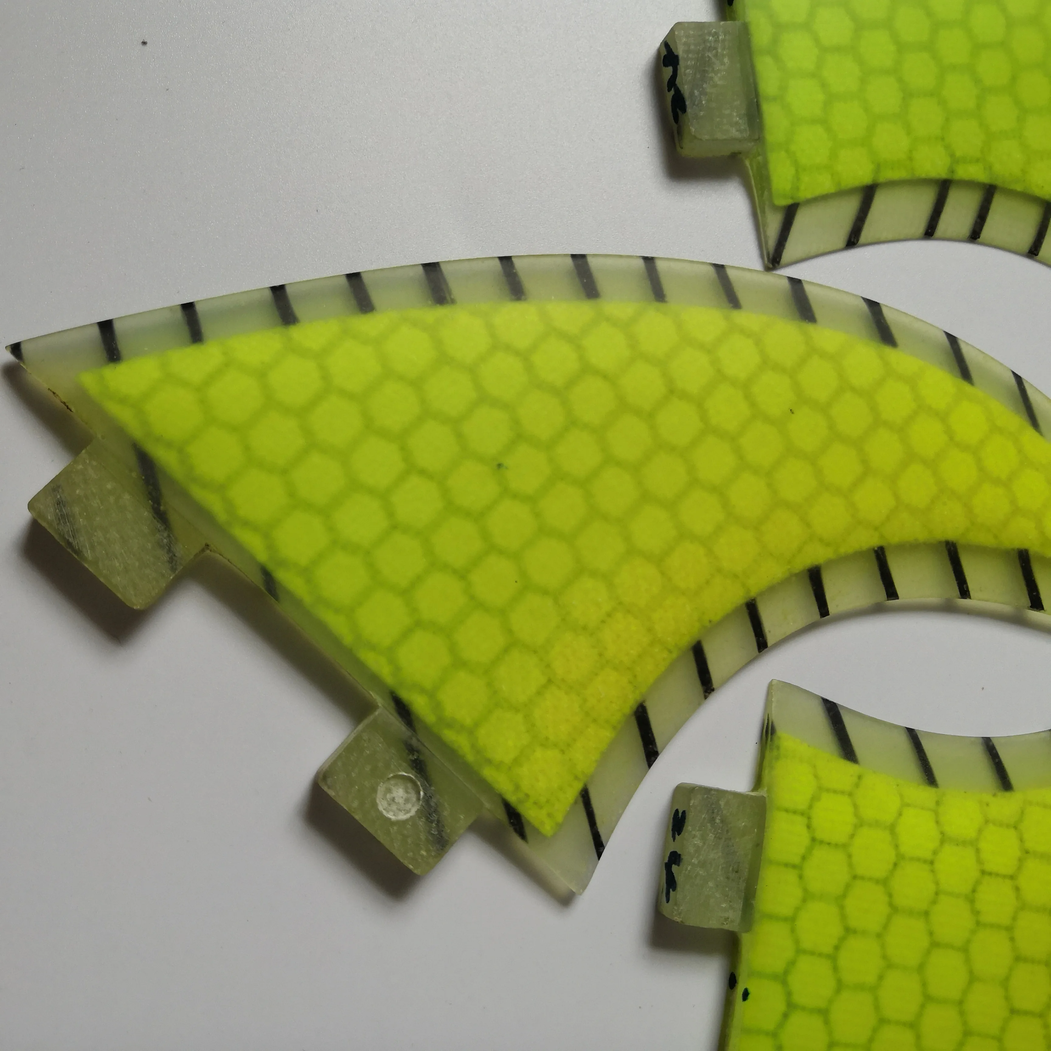 

green FCS honey comb fiberglass surf fin