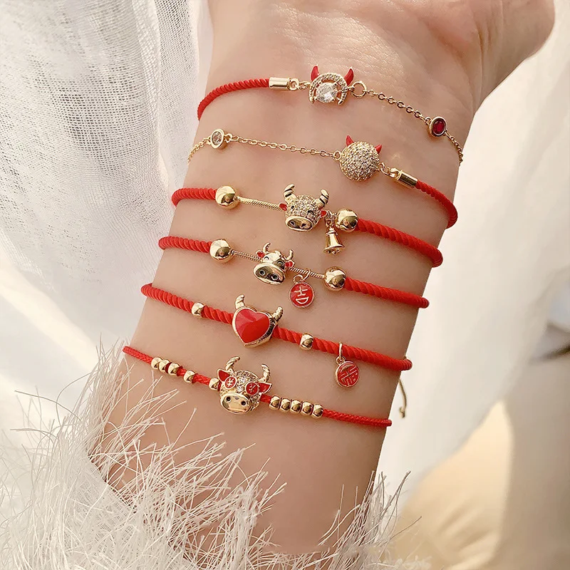 

2021 new year red rope bracelet female ins niche design natal year of the ox transfer red hand rope braided rope girlfriends cou