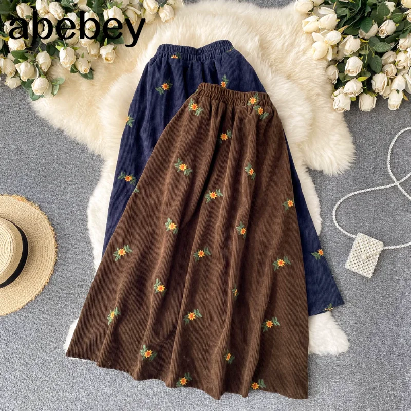 

Зимняя винтажная Вельветовая юбка, женская модная юбка А-силуэта с высокой талией, новинка 2022, осенние длинные юбки с вышивкой в Корейском с...