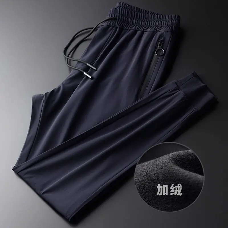 

Crisp texture pressed plastic pants bag design fashion Plush casual pants men's slim fit trend necked sports pants