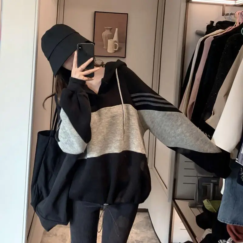 

2021 Spring/Autumn new loose lazy wind net red hooded women's Korean version of the super-fire striped long-sleeved top tide