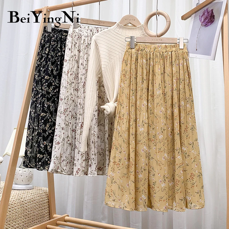 Beiyingni 2021 Summer Pleated Skirts Women Chiffon Floral Polka Dot Printed High Waist Midi Skirt Vintage Lining Casual Faldas
Beiyingni 2021 Summer Pleated Skirts Women Chiffon Floral Polka Dot Printed High Waist Midi Skirt Vintage Lining Casual Faldas