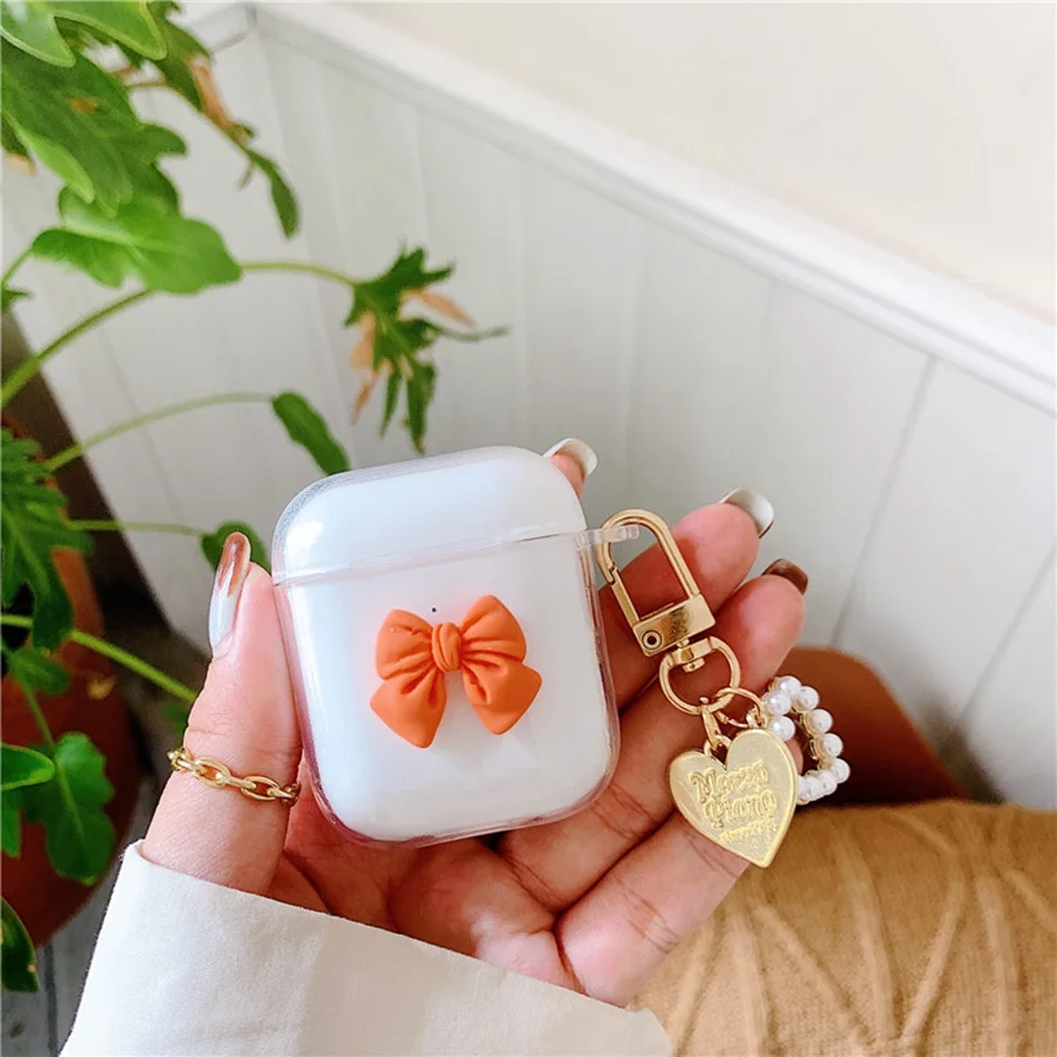 

Cute AirPods 2 Case Bow Knot Pearl Pendant Keychain For AirPods Case Transparent Plastic Earphone Cover Air Pods2 Fundas