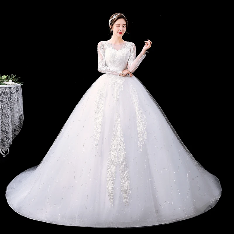 

Wedding Dresses Illusion O-Neck Full Sequined Embroidery Tulle Lace Backless Luxury White Train Vintage Women Bridal Gown FB623