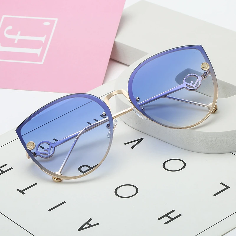 

2021 Metal Luxury Lady Cat Eye Sunglasses Women Party Vintage Rimless Gradient Sun Glasses For Female