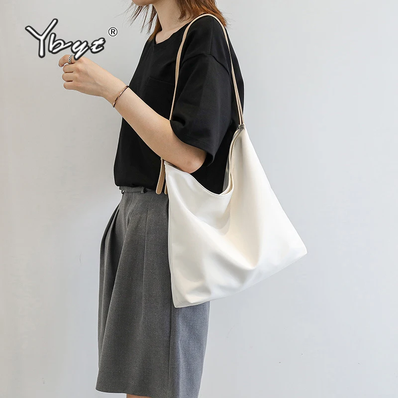 Женская нейлоновая сумка через плечо с ручками и плечевым ремнём |