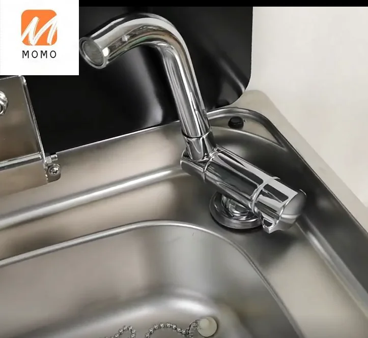 

The stainless steel sink of RV kitchen with toughened glass cover is clean and durable