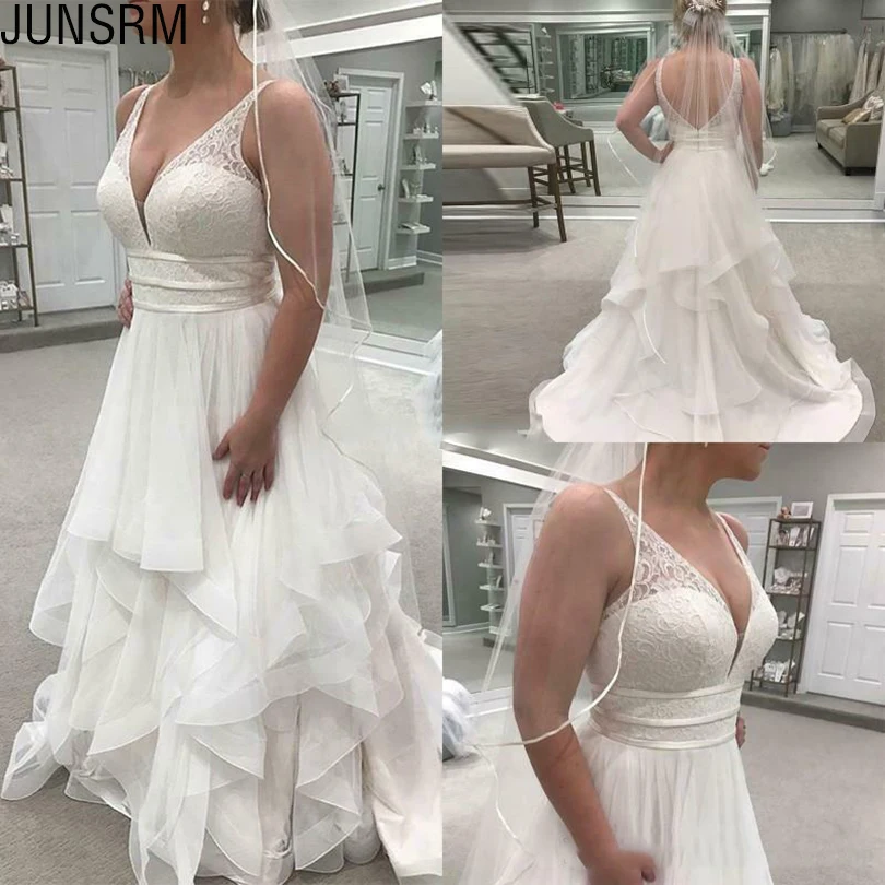 

Elegant Plus Size A Line Wedding Dress Sheer Sexy V-Neck Lace Tulle Sleeveless Ruffle Bridal Gown