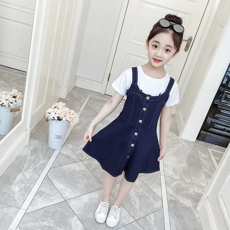 

Children's skirt. Large children's single breasted denim strap skirt