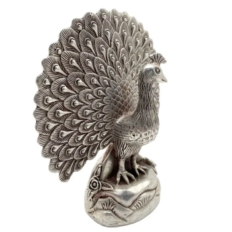 

Chinese Old Tibet Silver Carving Peacock