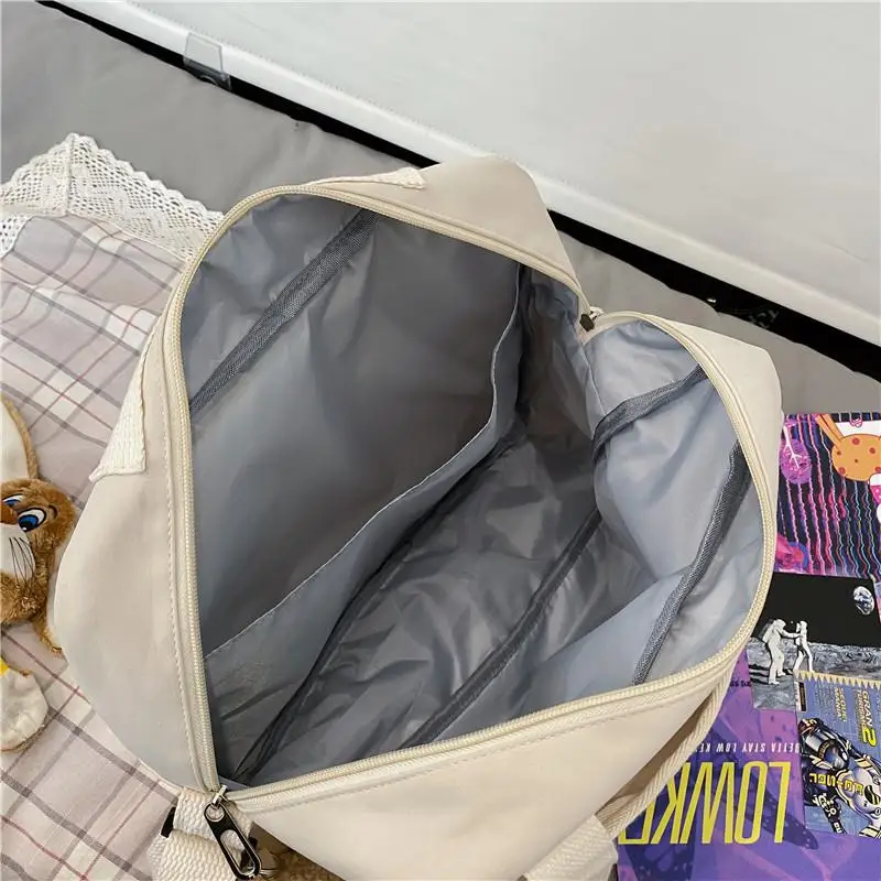 

2020 NewKorean Lovely girl Pure color One shoulder crossbody bag Fashionable Women Handbag Japanese Campus style Schoolbag