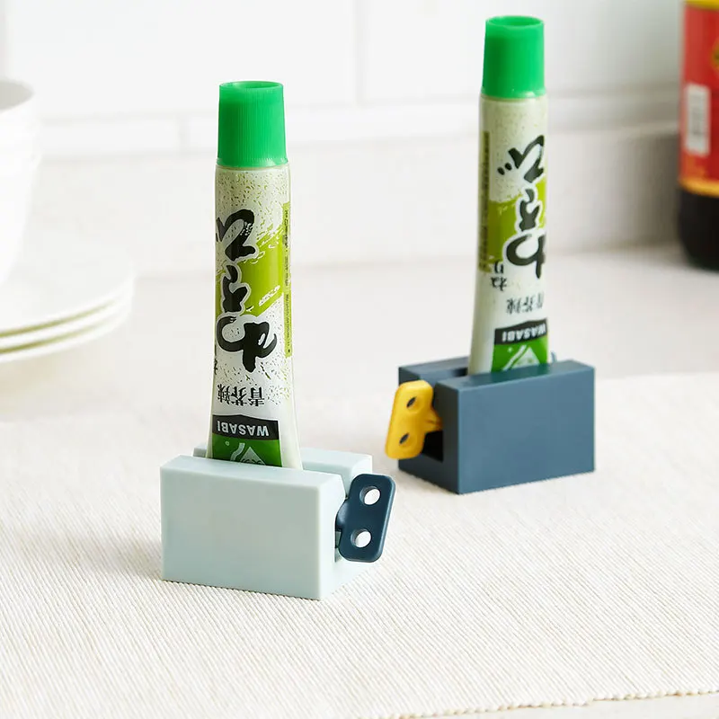 

Toothpaste Squeezers Extruder Cleanser Press Dispenser Device Household Lazy Rolling Holder Clip-on Bathroom Accessories