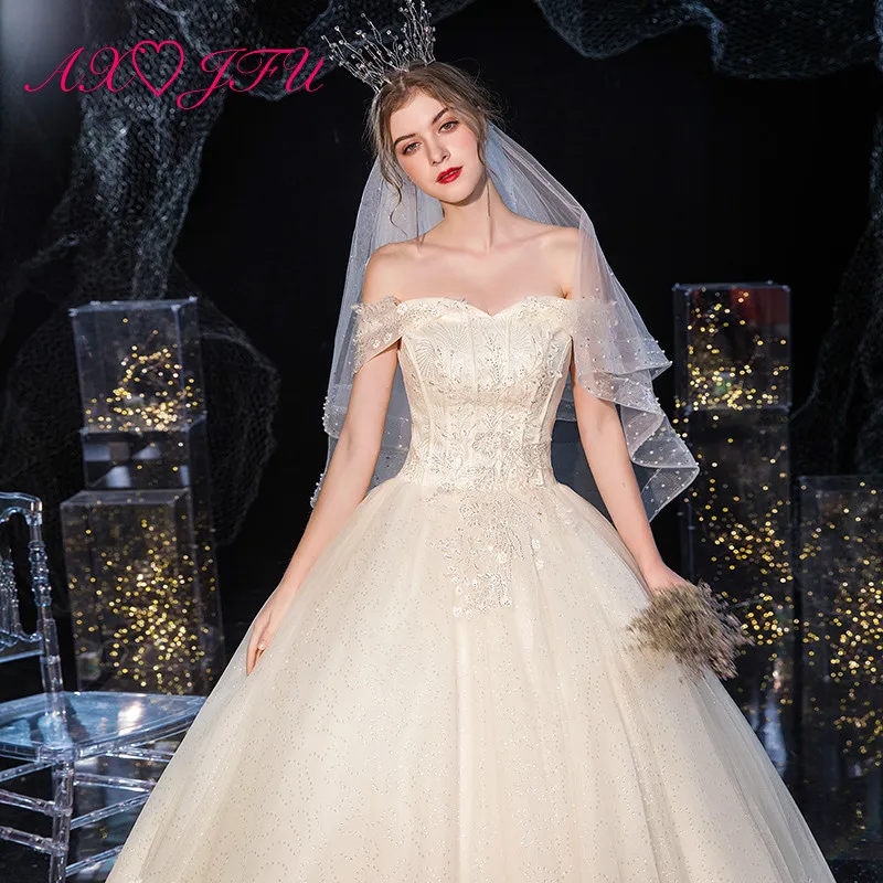 

AXJFU princess champagne little flower lace wedding dress vintage boat neck illusion bride champagne sparkly wedding dress