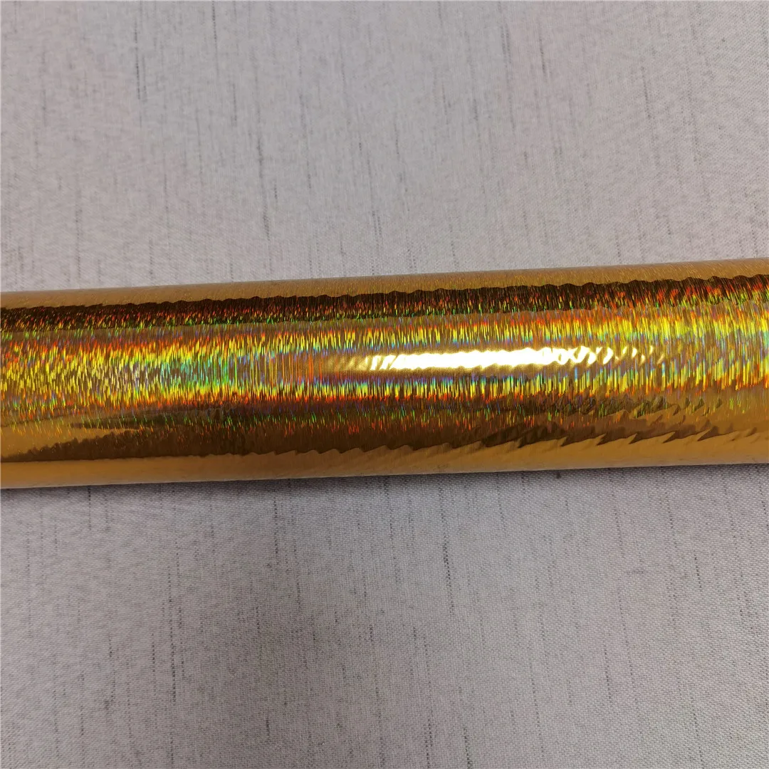 

Golden Pine Needles Pattern stamping foil on paper or plastic transfer design foil laminate film for fish lure and DIY nial