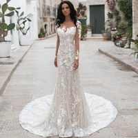 2021 new mermaid wedding dresses o neck illusion full sleeves button appliqued sequined floor length bridal gowns