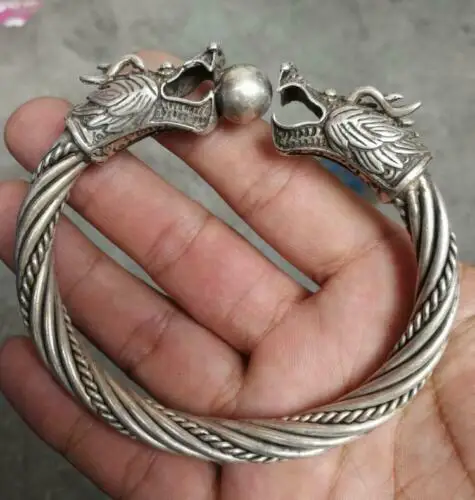 

China Tibetan silver hand-made engraving double-headed dragon silver bracelet