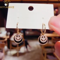 xiyanike wholesale white black smile drop earrings for women round alloy earrings 2021 trend new fashion party jewelry brincos