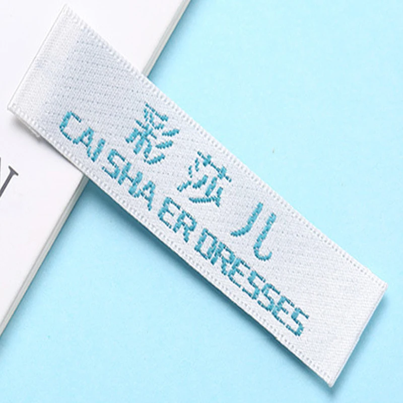 Специализирующийся на производстве одежды этикетка стандартная ткань