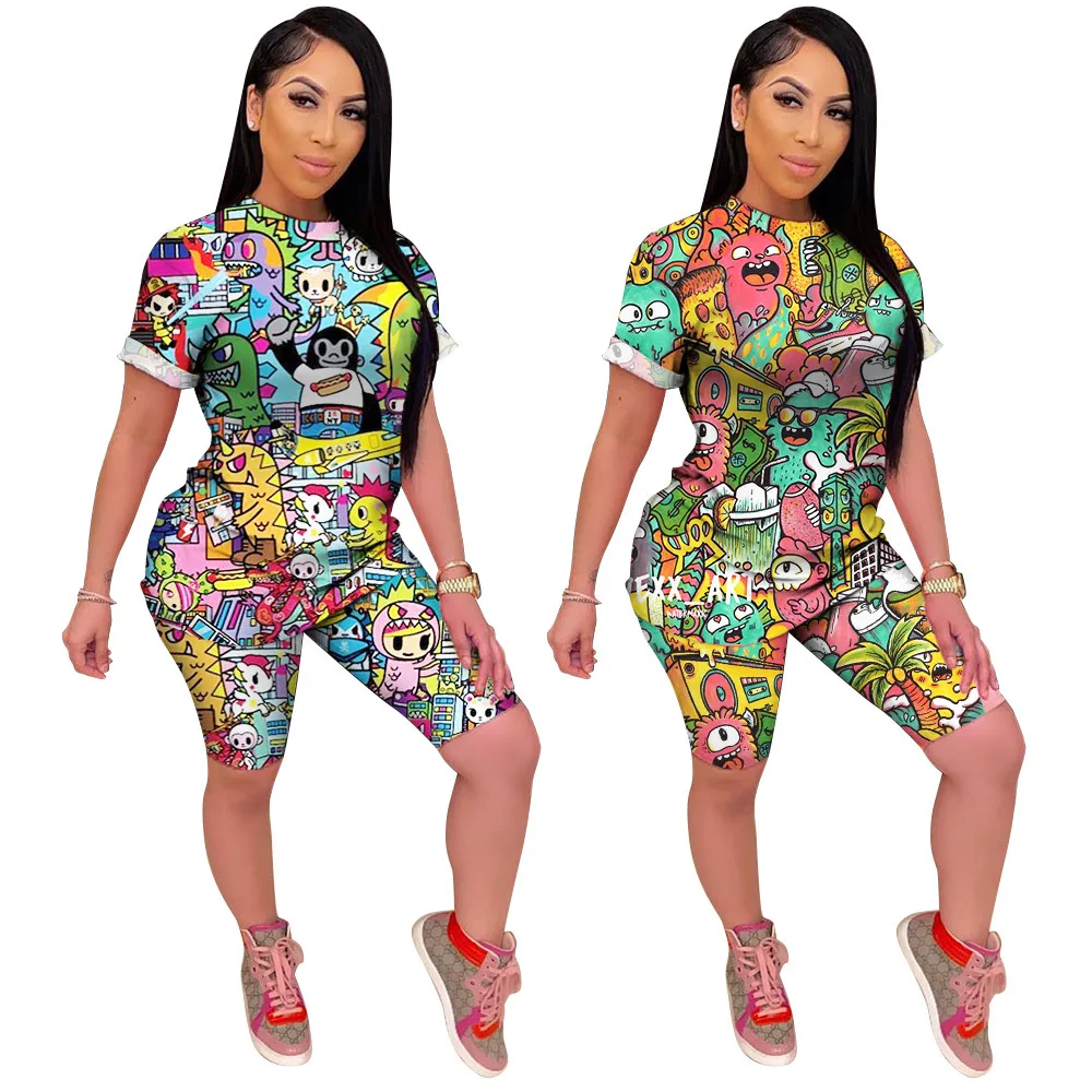 

The new two-piece tracksuit, cartoon print T-shirt with round neck and short sleeves, is a stylish five-cut pant suit for women