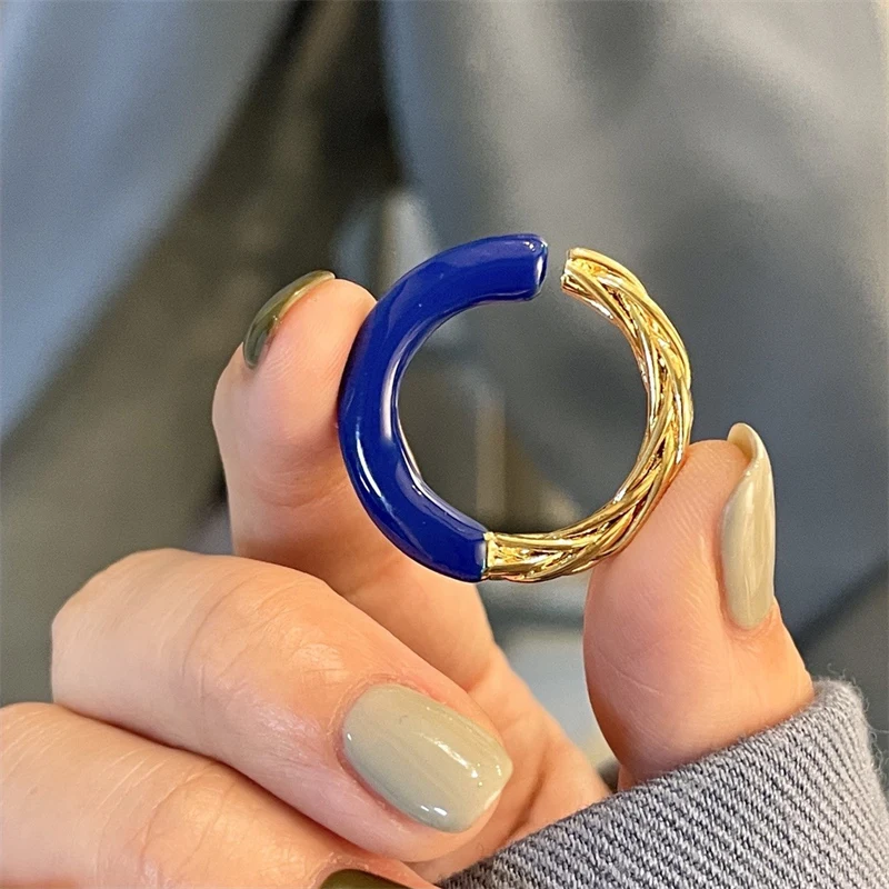 

New personality creative two-color stitching interlaced woven twist ring personality temperament female ring jewelry wholesale