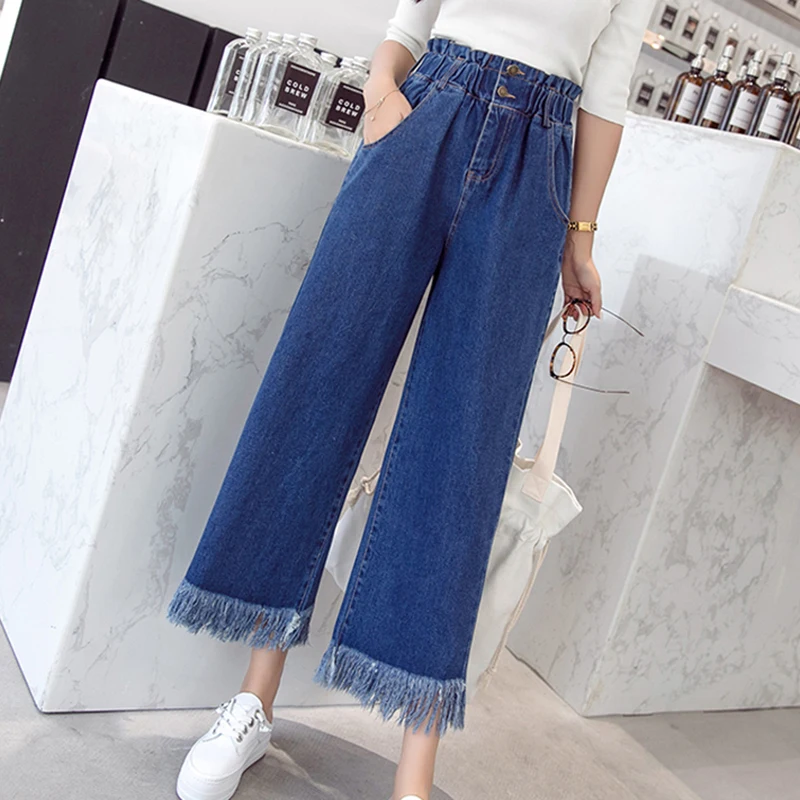 

Новые осенние женские джинсы размера плюс с бахромой и высокой талией, эластичные джинсовые штаны длиной до щиколотки, свободные широкие же...