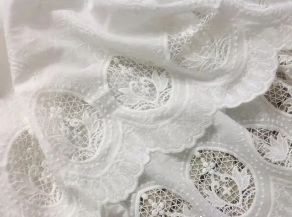 

Cotton Lace Fabric With Hollowed Out Floral Pattern