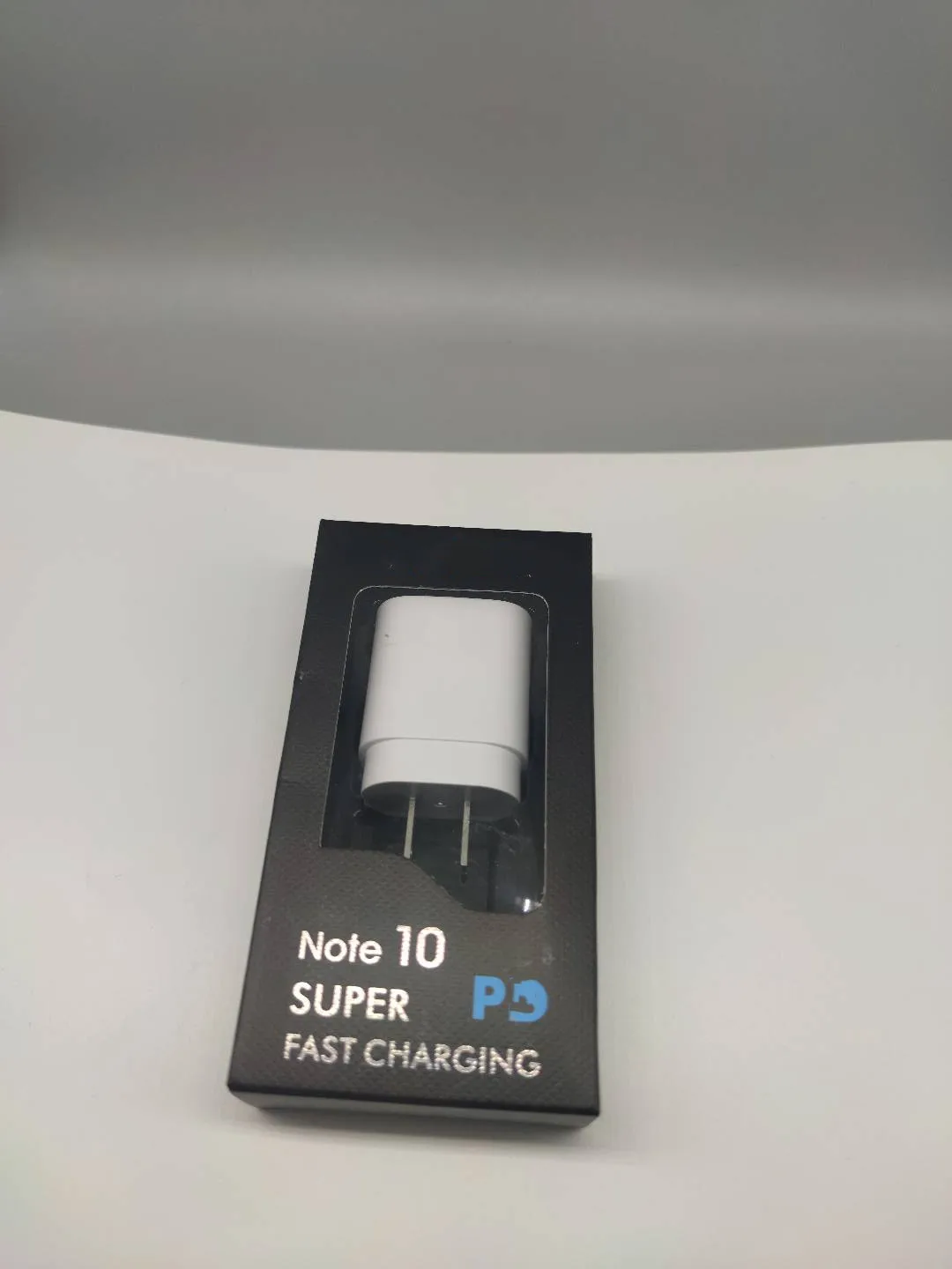 

25wpd mobile phone charger with packaging