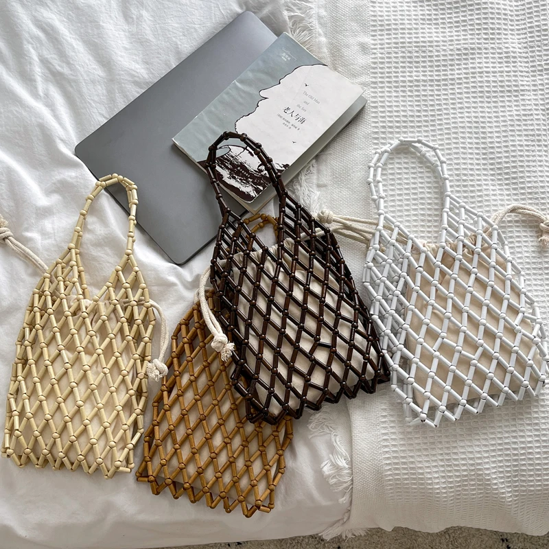 

Knitting Wooden Beaded Mini 2022 New Women's Bag Hollow Out Hand Youth Handbags Personalized Ladies Wrist Bags Composite Package