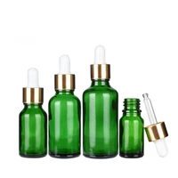 10pcslot 5ml to 100ml lab green round glass refined oil bottle with glass droppers golden circle for school experiment
