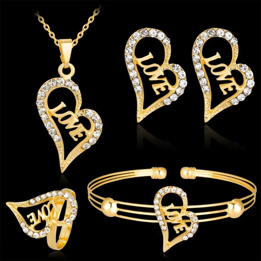 

Women Rhinestone Heart LOVE Pendant Necklace Earing Bracelet Ring Jewelry Set Necklaces For Women Sterling Decoration 2021 Trend