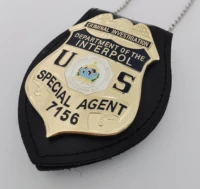 american department of interpol no 7156 badge and accessories film and television props