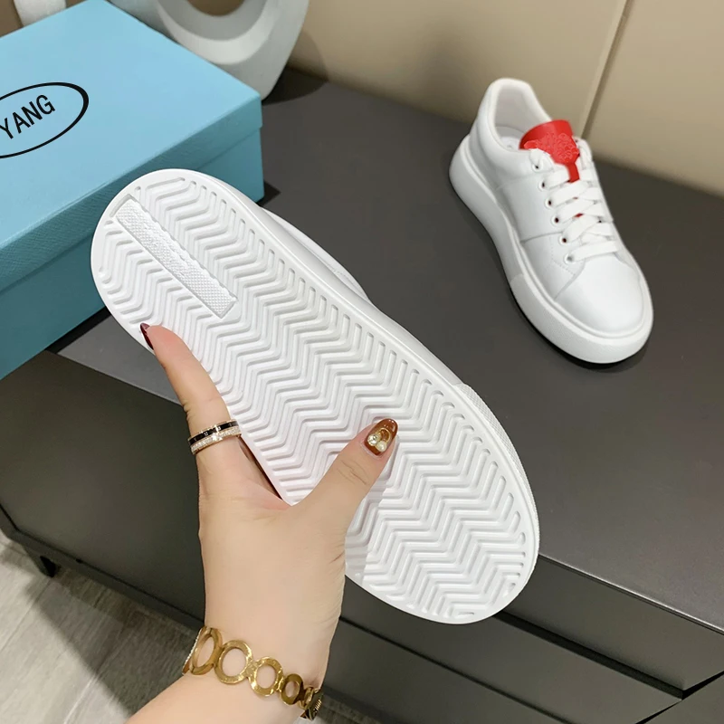 

New fashion trend in spring and summer of 2021 small white shoes with thick soles women's casual sports shoes lace up flat shoes