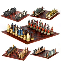 genghis khan vs russia war theme chess set 32 3d figures with carved and painted chess pieces paired with an embossed board