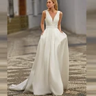 Богемные простые трапециевидные Свадебные платья 2021 с V-образным вырезом без рукавов атласный со шлейфом для женщин Свадебные фотоплатья на заказ