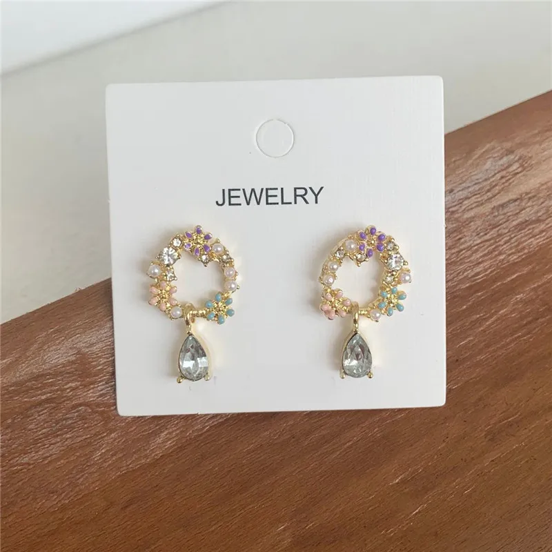 Женские круглые серьги-подвески с кристаллами | Украшения и аксессуары