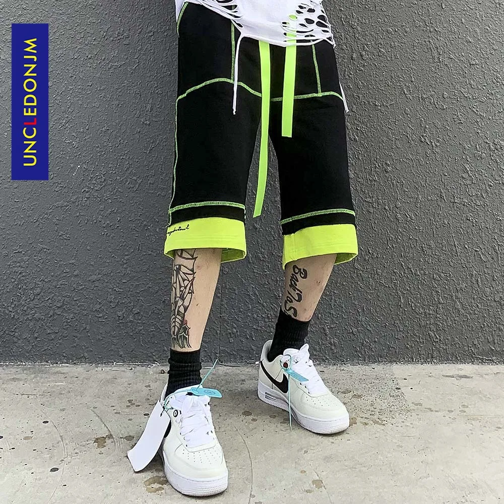 

UNCLEDONJM Colour Block Designer shorts men Hip Hop sweat shorts Loose Knee Length running shorts for men summer UK2112