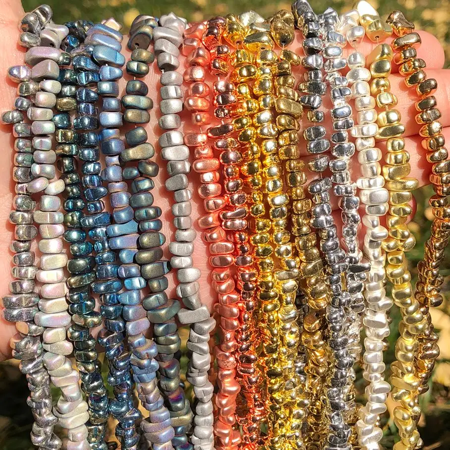 

Бусины из гематита с золотым и серебряным покрытием