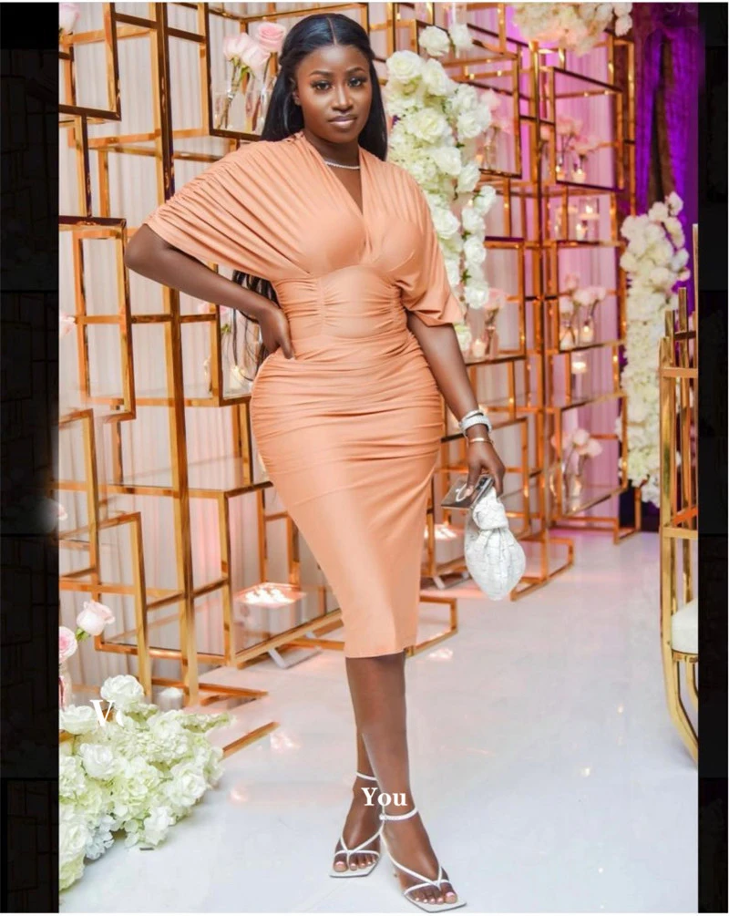 

Платье вечернее длиной до колен с рукавами-фонариками и V-образным вырезом