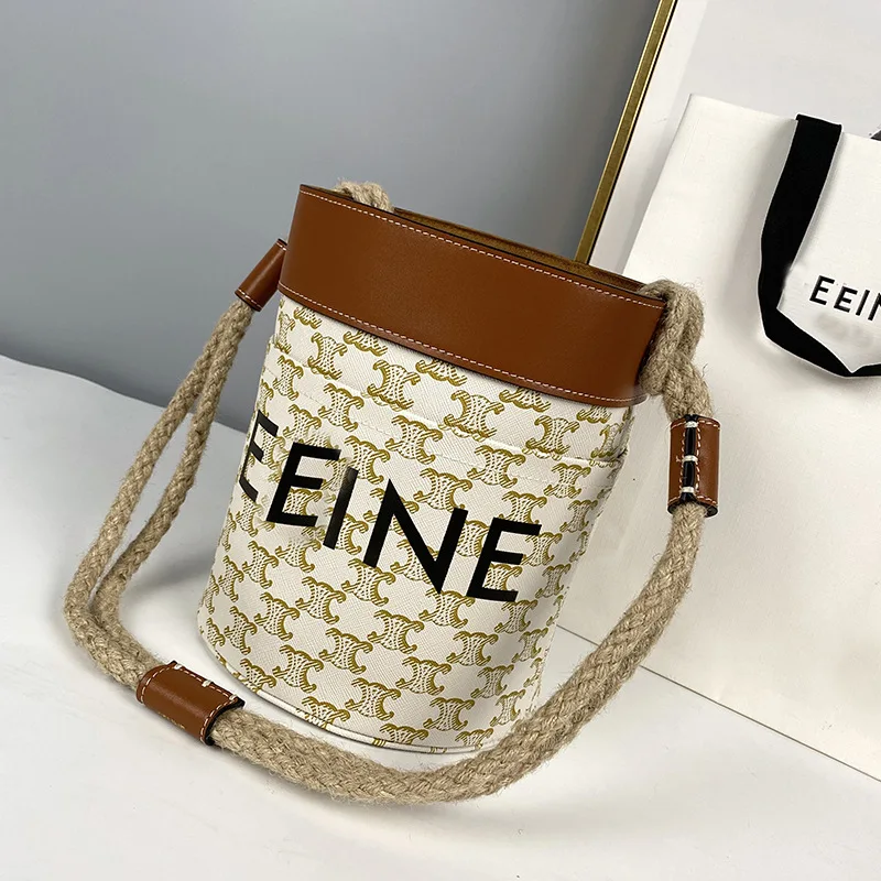 

Bucket bag hemp rope retro single shoulder armpit bag cowhide stitching handbag simple fashion commuter handbag