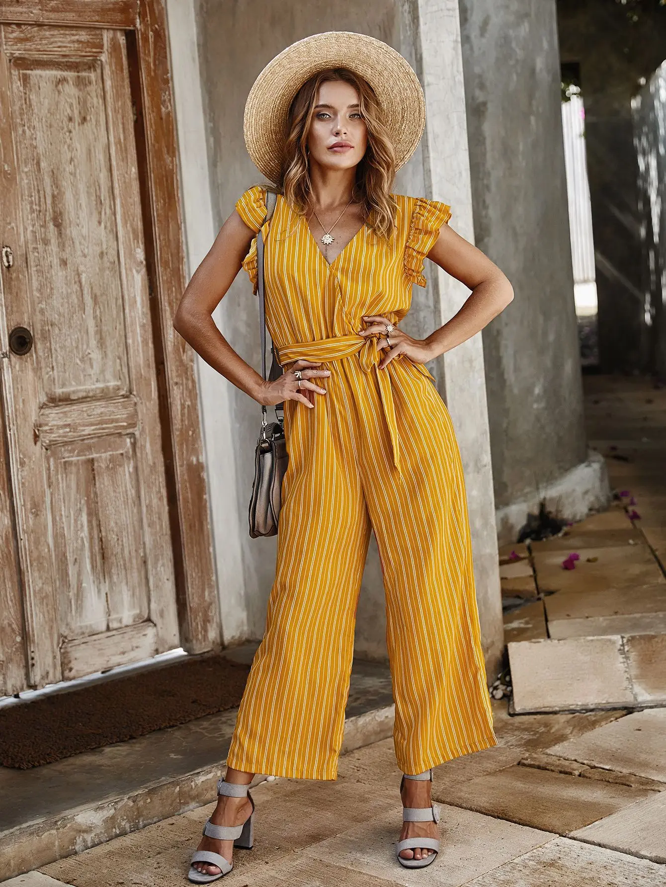 

2021 summer new casual fashion women's temperament striped sexy lotus leaf sleeve jumpsuit women