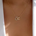 Женское ожерелье с кулоном в виде двух сердец