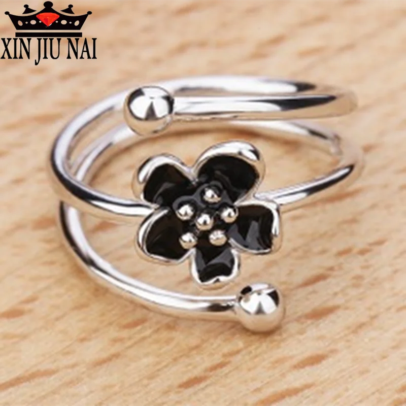 Женское многослойное кольцо таинственные цветы черное с кубическим цирконием в