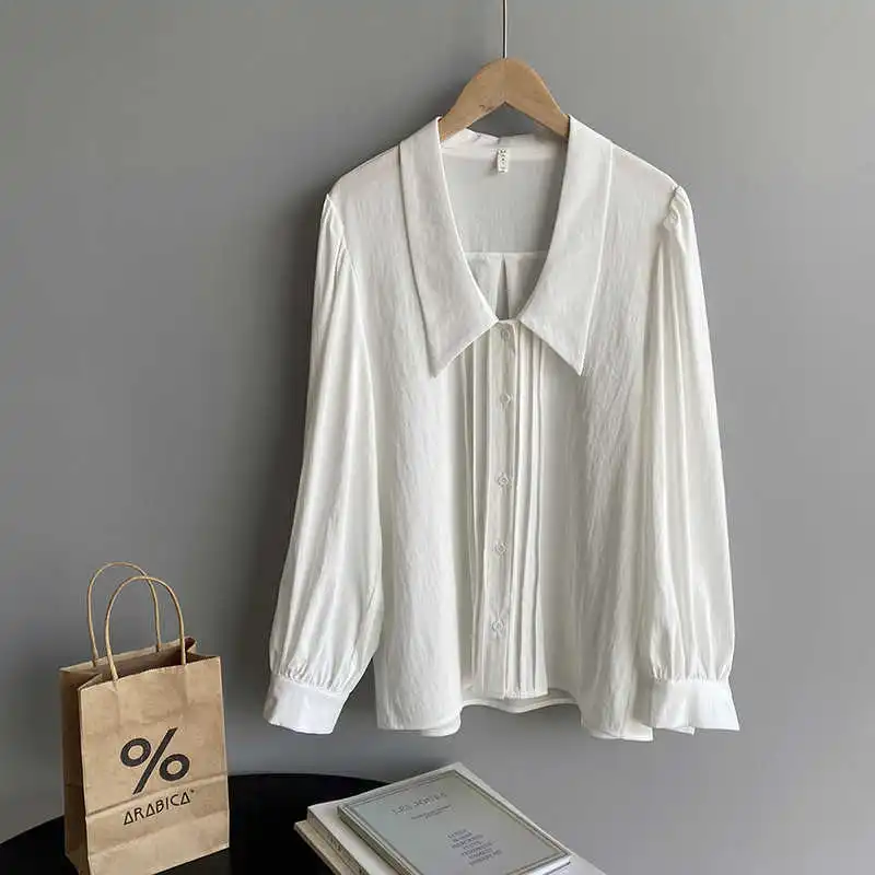 

COZOK French Korean Lapel Shirt Women's 2021 Spring Temperament Wrinkle Design Solid Color Long Sleeve Shirt 756