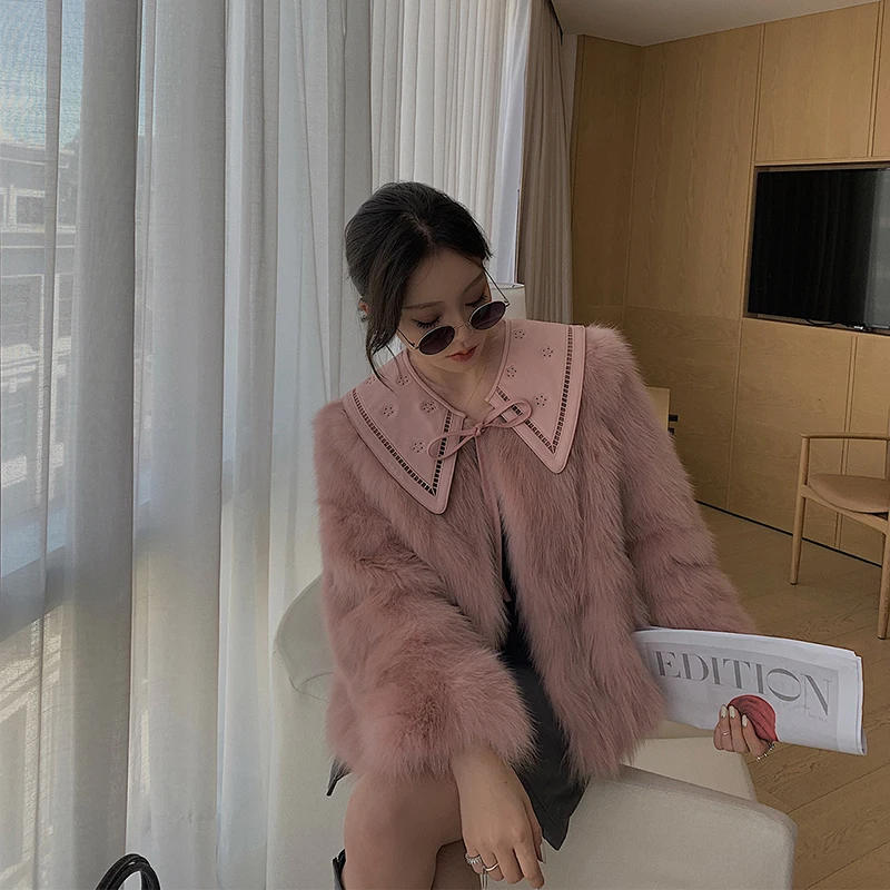 

Женская короткая куртка из овечьей кожи с воротником-стойкой