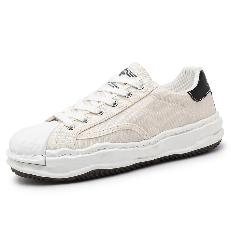 

Men's Sports Shoes Japanese Shell-head Lattice Dissolving Shoes Men's Solid Color Canvas Breathable Trend Men's Casual Shoes